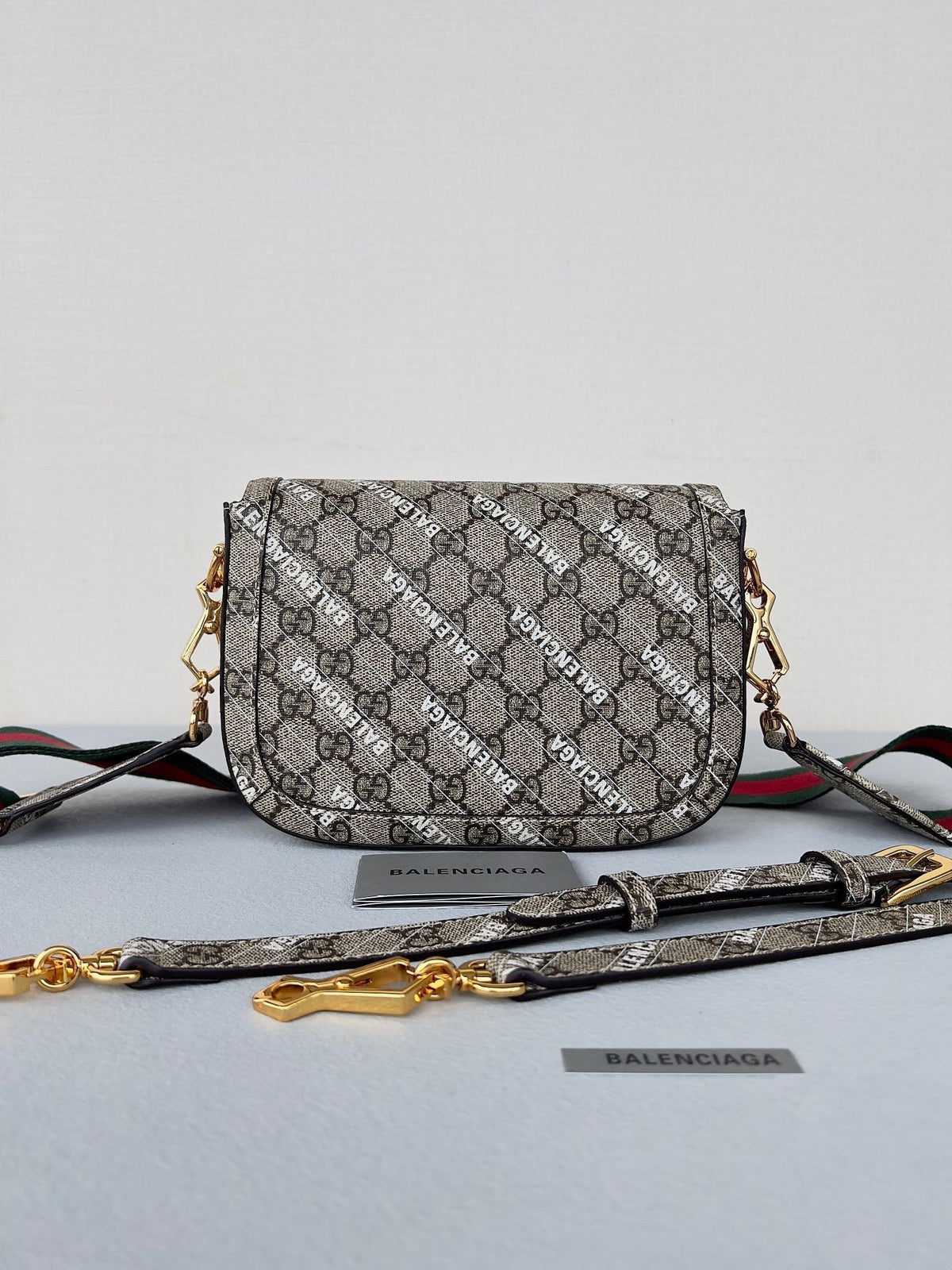 GUCCI MINI 25 PRINTED SADDLE BAG IN EICRU BEIGE CANVAS